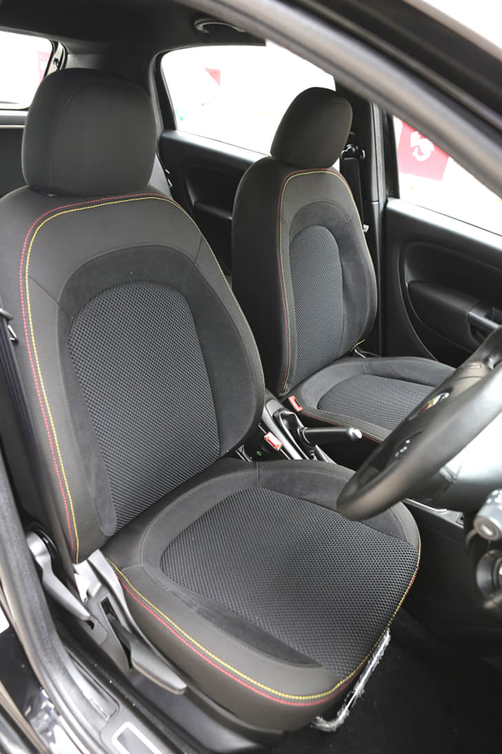 The interior retains the all-black theme from the Punto Evo 90HP but uses different seat fabrics and gets red and yellow contrast stitching.
